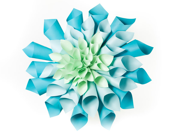 Origami flower shape made out of rolled sheets of paper